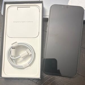 Apple Smartphone with White Charging Cable